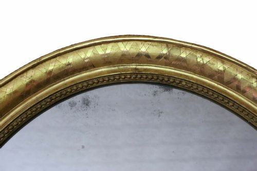 fig 1. Antique large fine quality oval 19th Century gilt overmantle wall mirror
