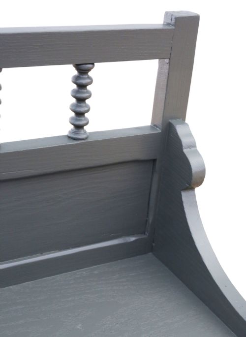 fig 1. An antique grey painted wooden wall display shelf featuring a top gallery rail with turned spindles and shaped side brackets.