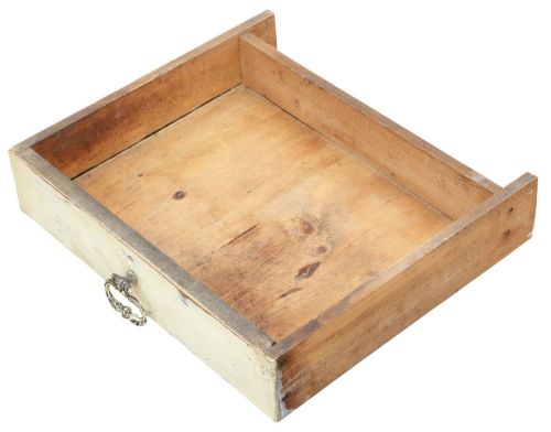 fig 4. A 19th-century two-tier wooden storage cupboard painted in distressed cream, featuring fluted side details, upper and lower double doors with fielded panels, and two central drawers.