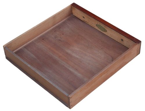 fig 4. A 19th-century mahogany writing and dressing table featuring two frieze drawers with turned handles, a low gallery back, and tapered turned legs.