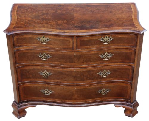 fig 1. A serpentine-front burr walnut chest of drawers featuring crossbanded borders, cast brass handles, and ogee bracket feet.