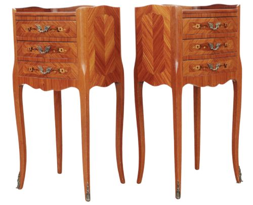 fig 4. A pair of slim French style bedside tables featuring floral marquetry wood inlays, three drawers with brass handles, and slender cabriole legs.