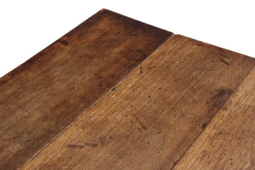 fig 3. A Georgian oak drop-leaf Pembroke table featuring turned legs, a single end drawer, and brass castors.