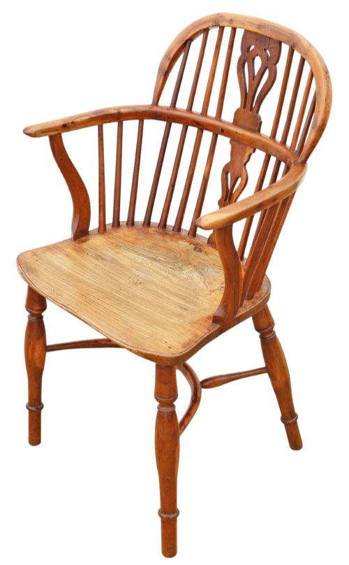 fig 1. A 19th-century yew and elm Windsor armchair featuring a hoop back, pierced central splat, turned legs, and a crinoline stretcher.