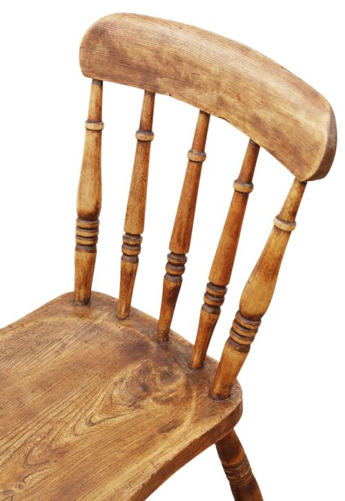 fig 5. A harlequin set of ten 19th-century Victorian dining chairs crafted from elm and beech wood, featuring spindle backs, curved top rails, turned legs, and stretchers.