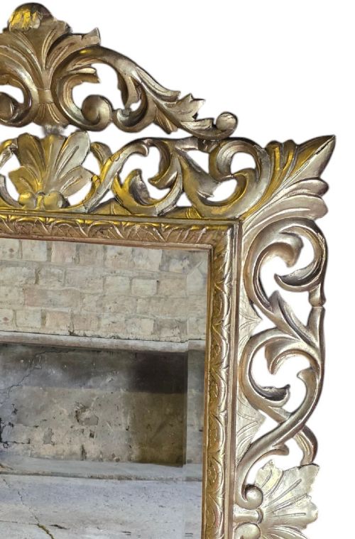 fig 3. A rectangular 19th-century Florentine wall mirror featuring a carved openwork giltwood frame with scrolling acanthus leaves.
