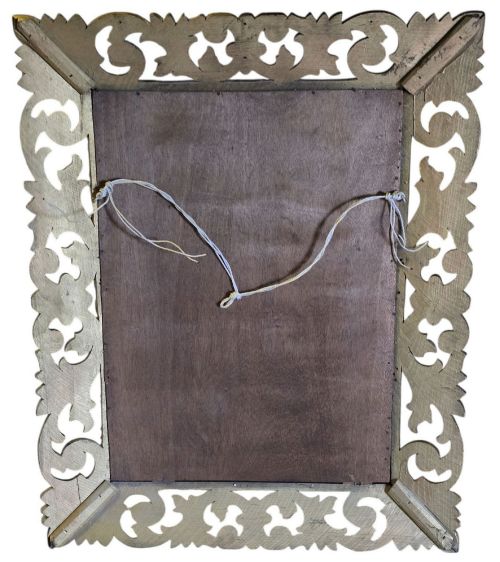 fig 6. A rectangular bevelled glass mirror set within an intricately carved gold giltwood frame with openwork acanthus leaves and scrollwork.