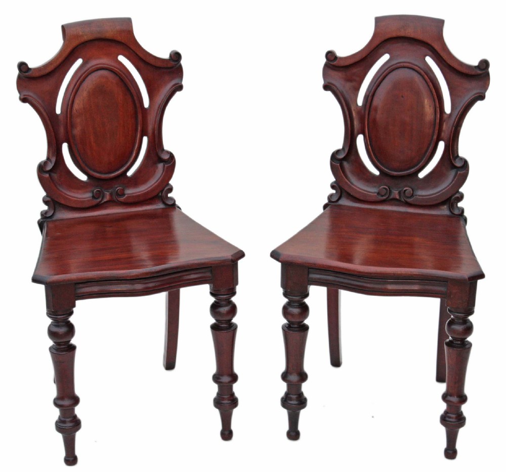 Pair of Victorian carved mahogany hall side chairs
