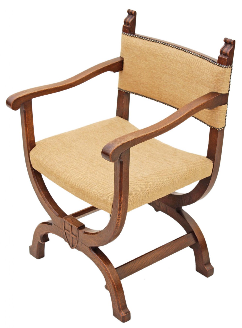 Carved oak x-frame desk chair elbow