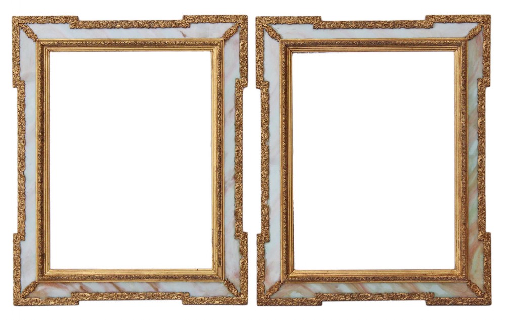 Pair of onyx and giltwood wall mirrors overmantle