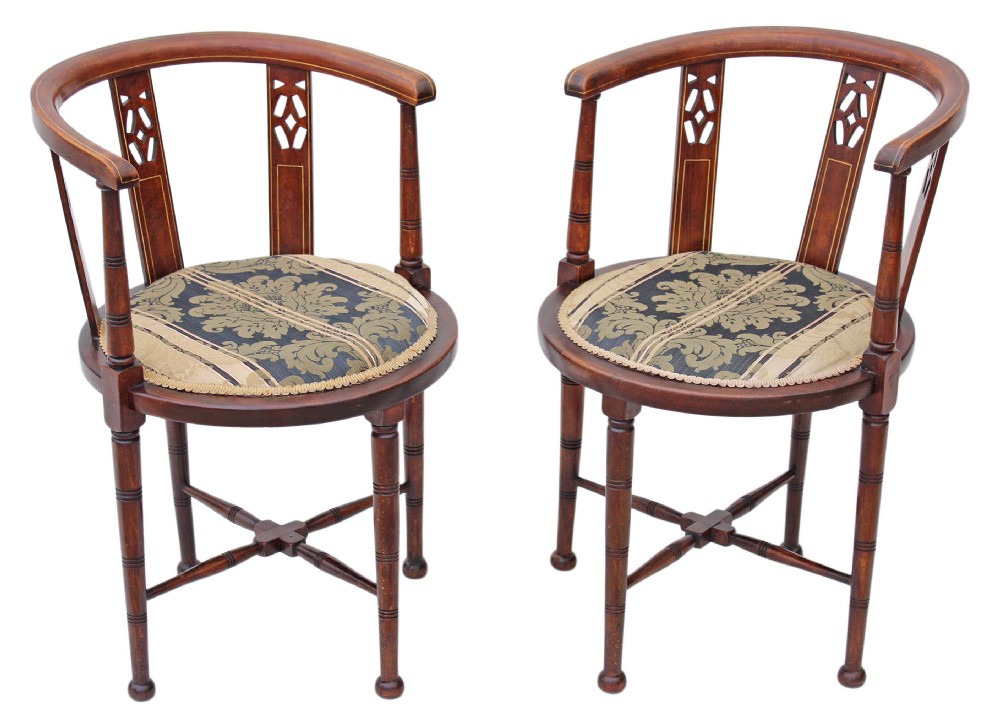 Pair of Edwardian mahogany corner arm chairs tub