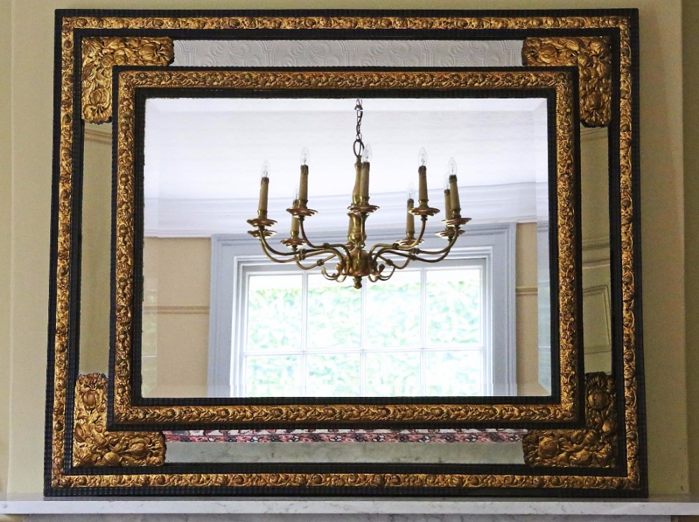Victorian ebonized gilt cushion wall mirror overmantle