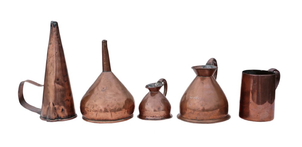 4 Victorian copper measuring jugs and funnel