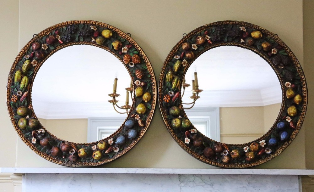 Pair of 19th Century circular wall mirrors Italian still life relief