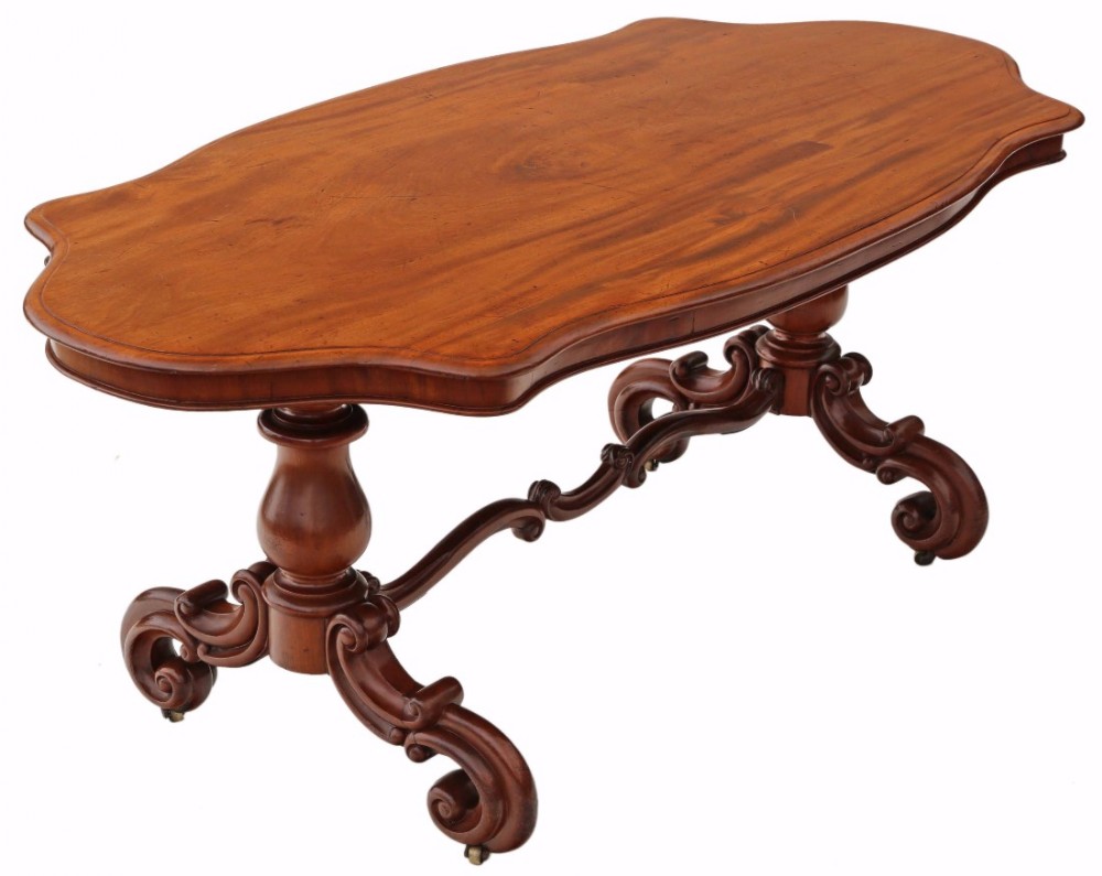 Victorian mahogany serpentine centre loo table