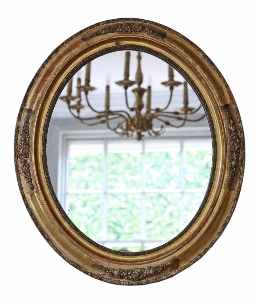 Victorian oval gilt wall mirror