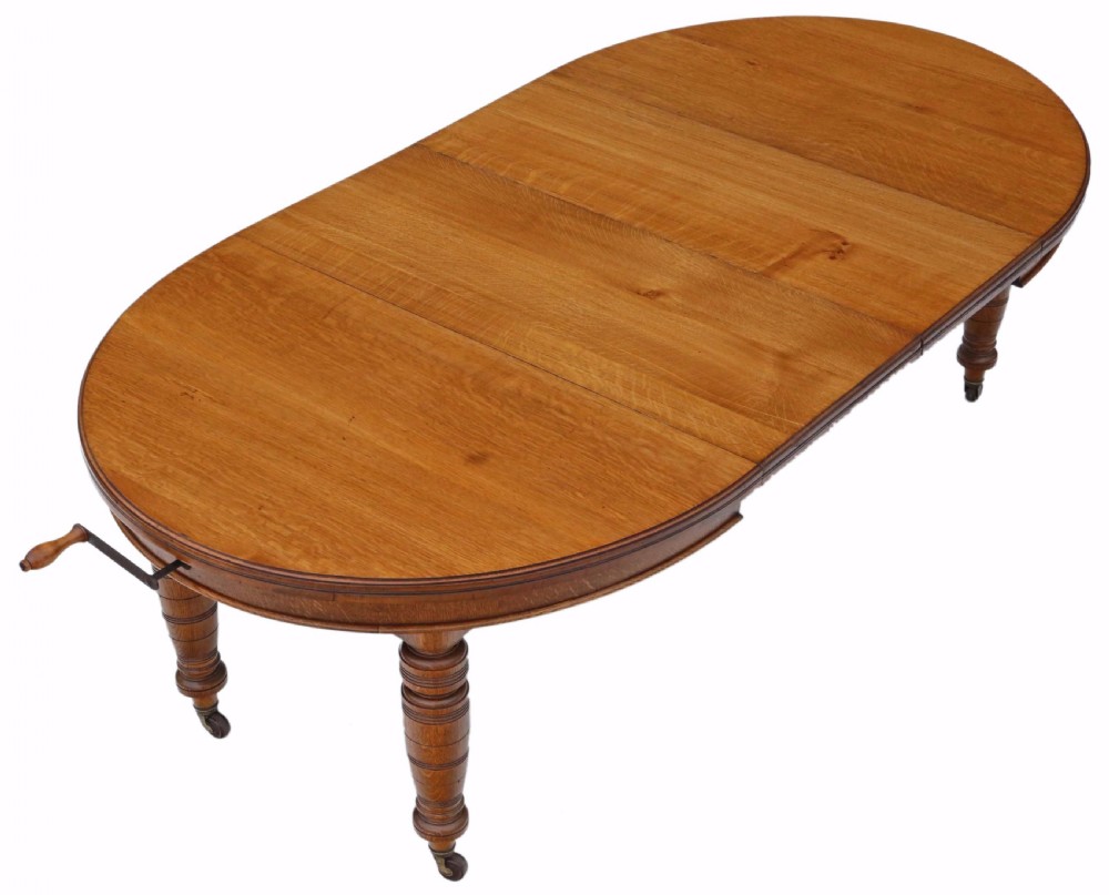 Victorian oak wind out D end dining table