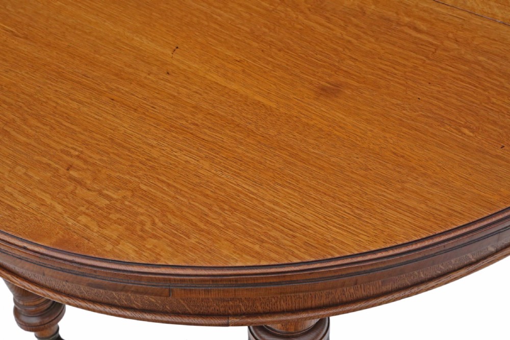 Victorian oak wind out D end dining table View III