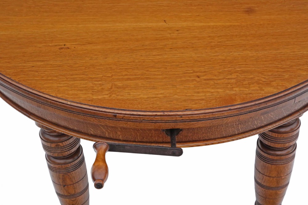 Victorian oak wind out D end dining table View IV