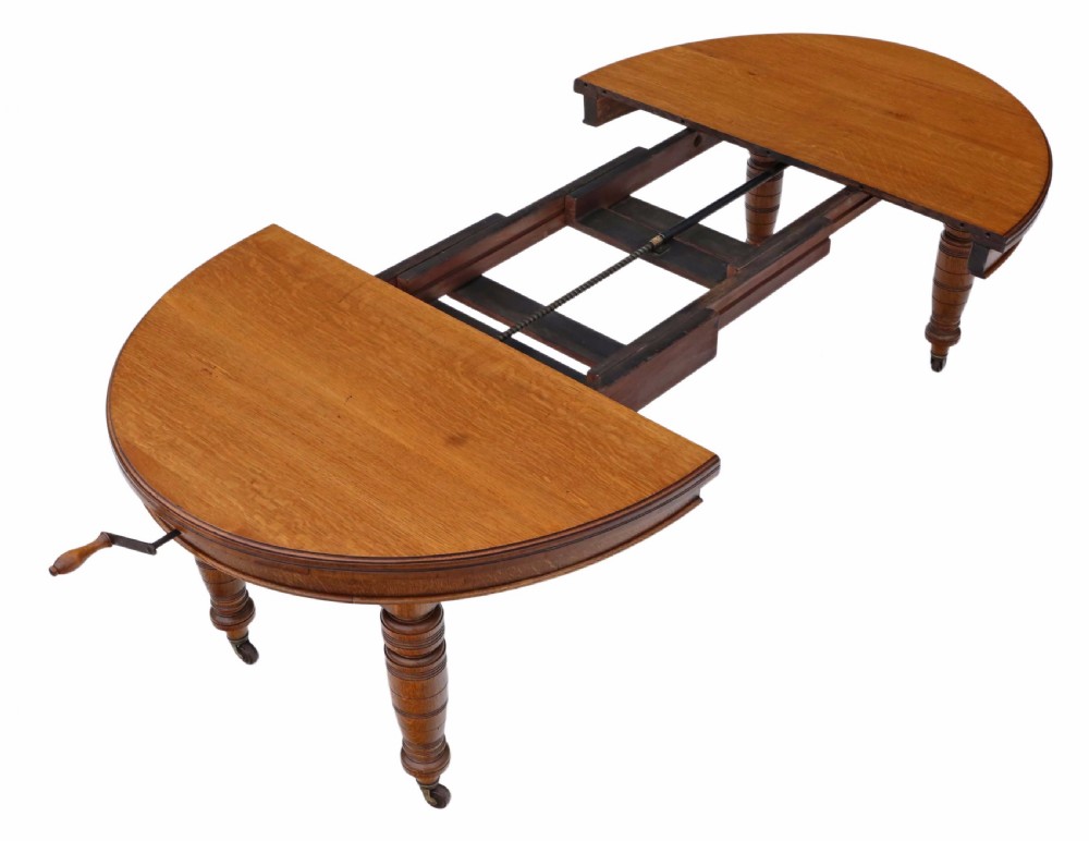 Victorian oak wind out D end dining table View IX