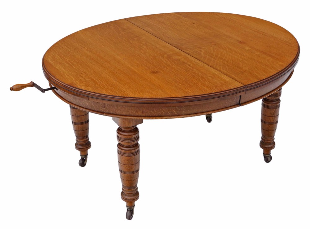 Victorian oak wind out D end dining table View X
