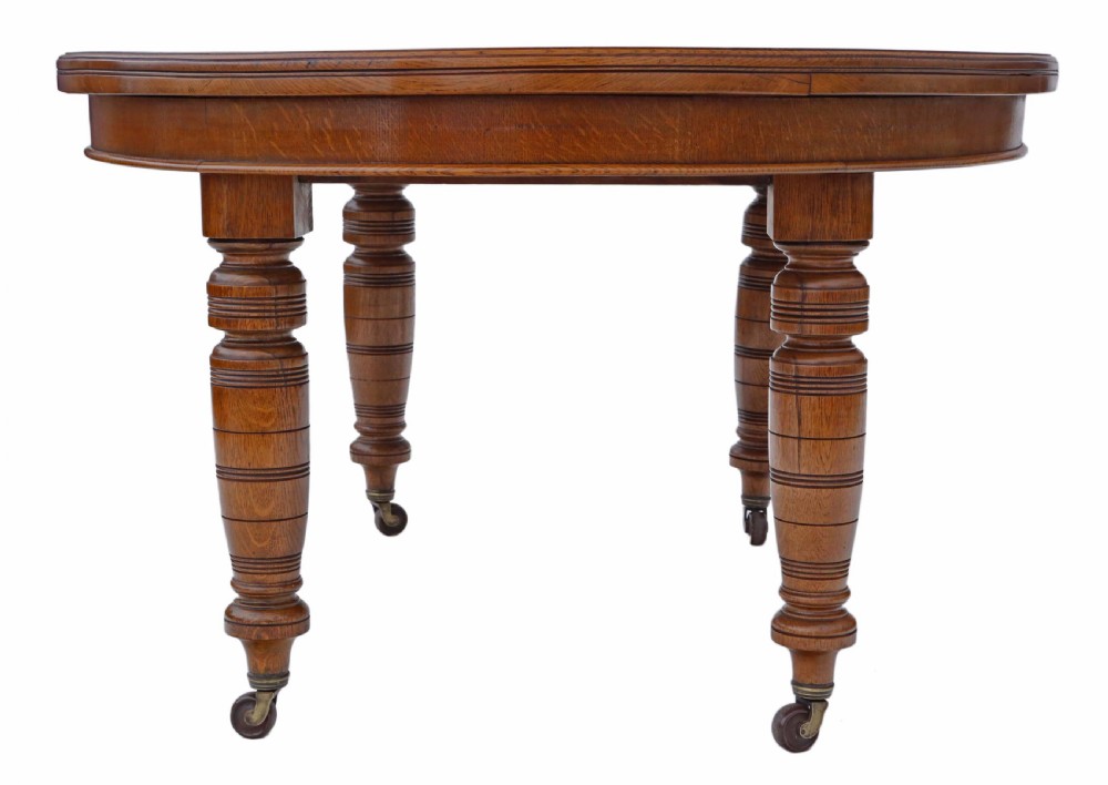 Victorian oak wind out D end dining table View XI
