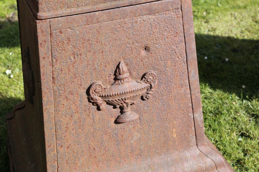 Pair of Victorian cast iron planters classical urns on plinths View VI