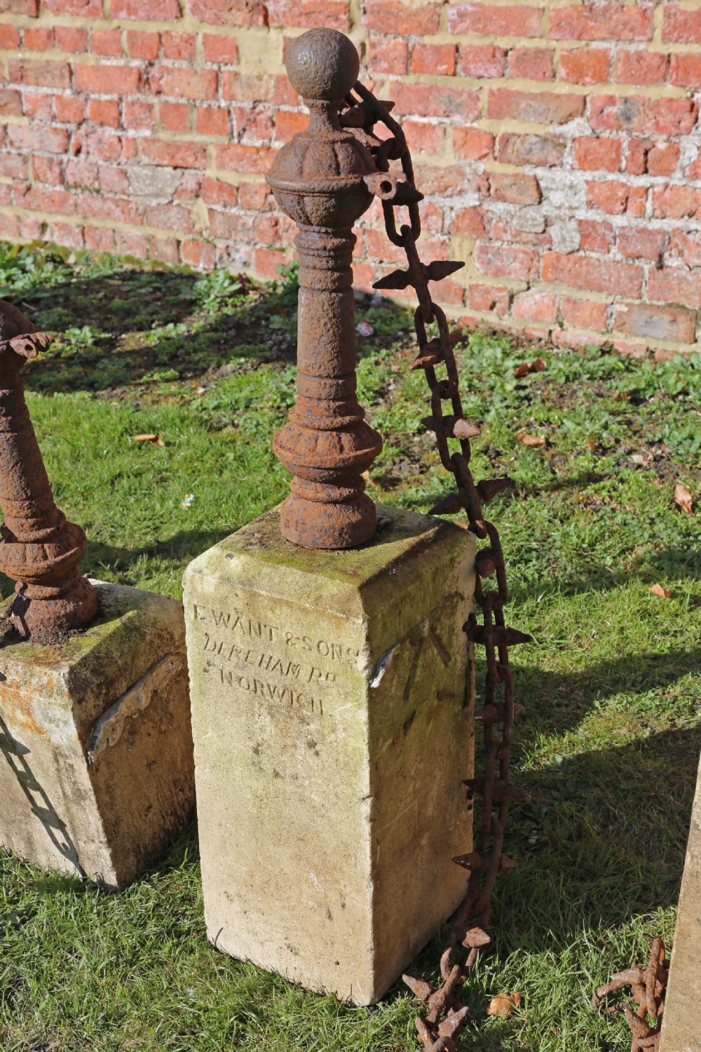 Set of 7 cast iron bollards with stone bases View IV