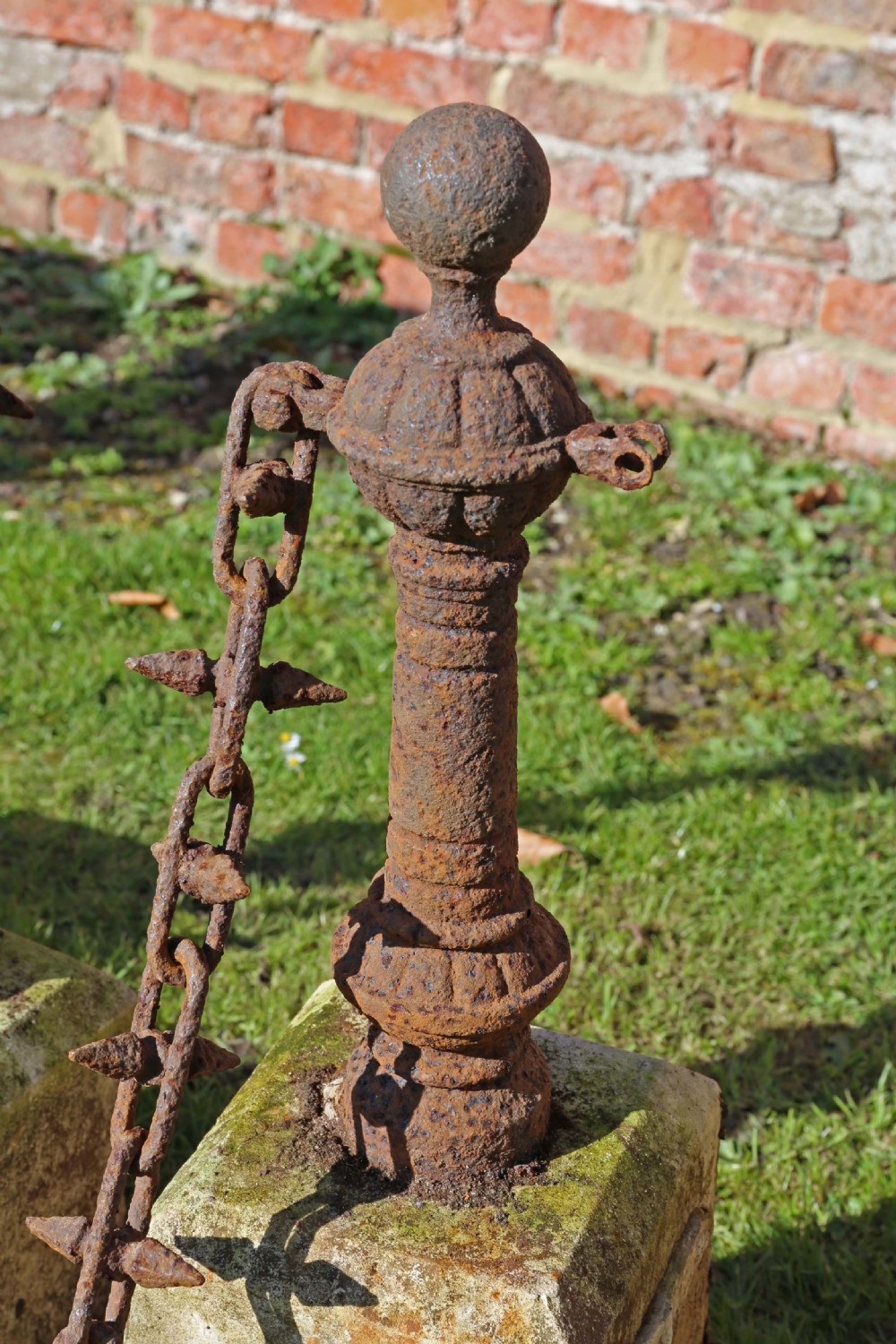 Set of 7 cast iron bollards with stone bases View VI