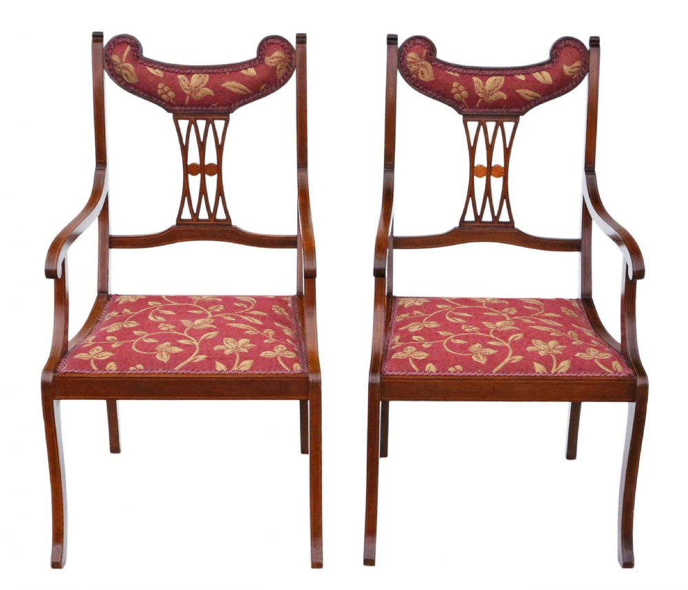 Pair of inlaid mahogany elbow chairs