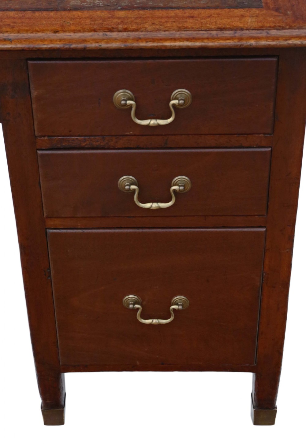 A mahogany twin pedestal writing desk featuring a worn brown leather top insert, multiple drawers with brass handles, and square tapered feet. View VII