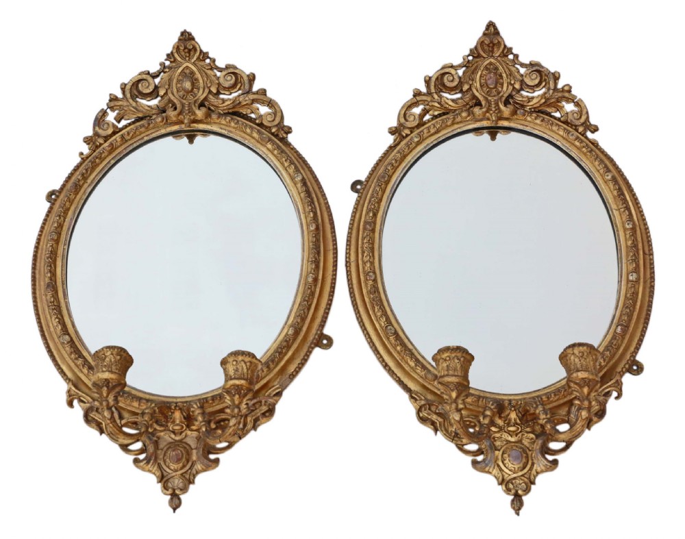 Pair early 19th Century gilt girandole wall mirrors 