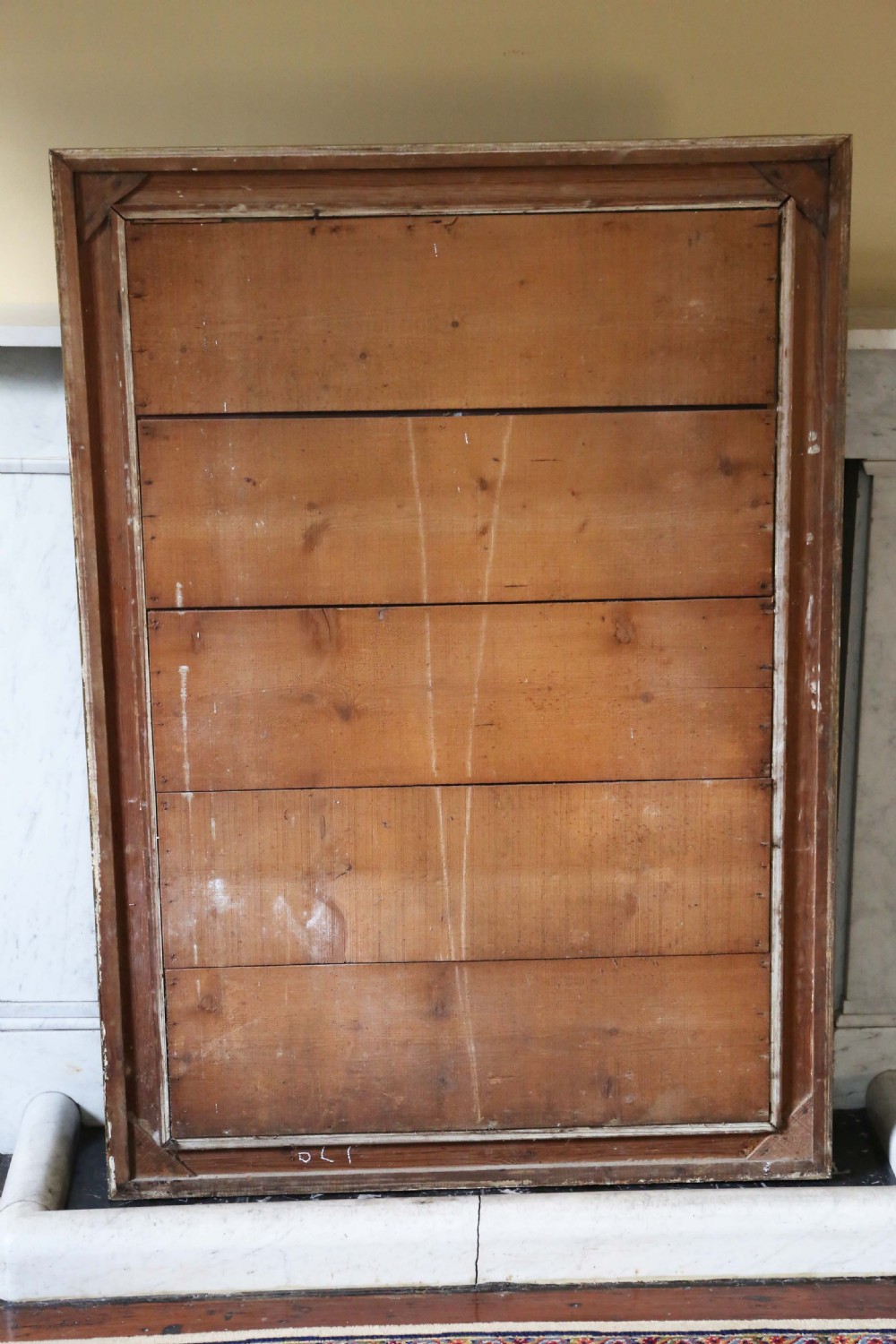 A large rectangular wall mirror featuring a linear reeded gilt wood frame. View VII