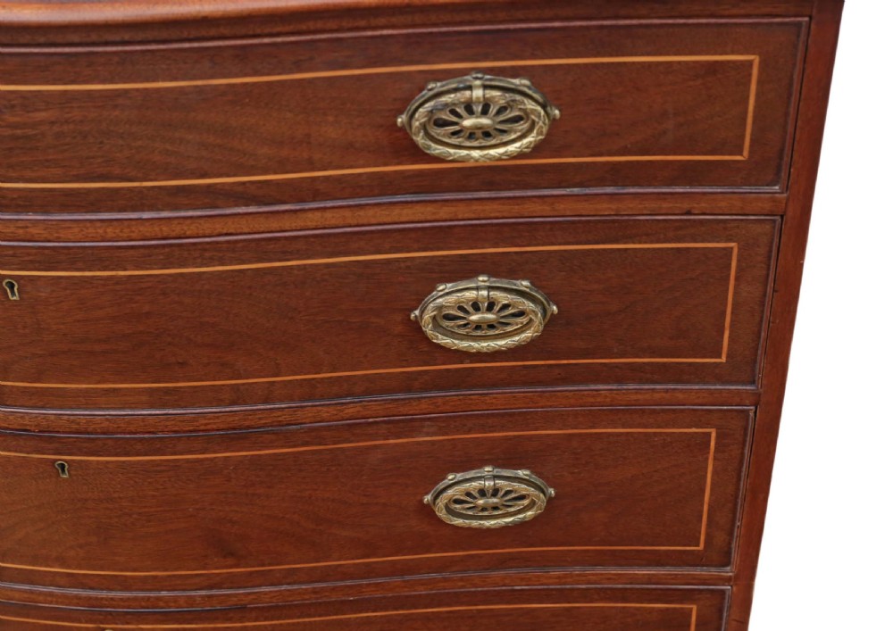 19th Century serpentine inlaid mahogany chest of drawers View III