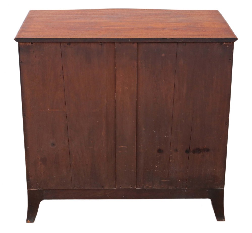 19th Century serpentine inlaid mahogany chest of drawers View IV