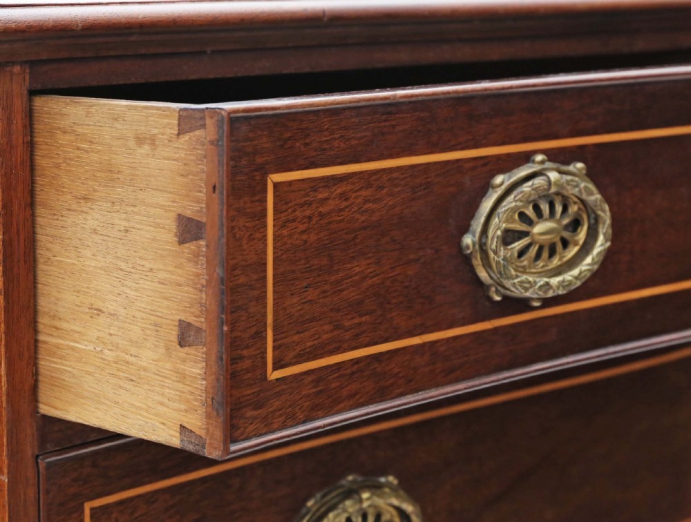 19th Century serpentine inlaid mahogany chest of drawers View V