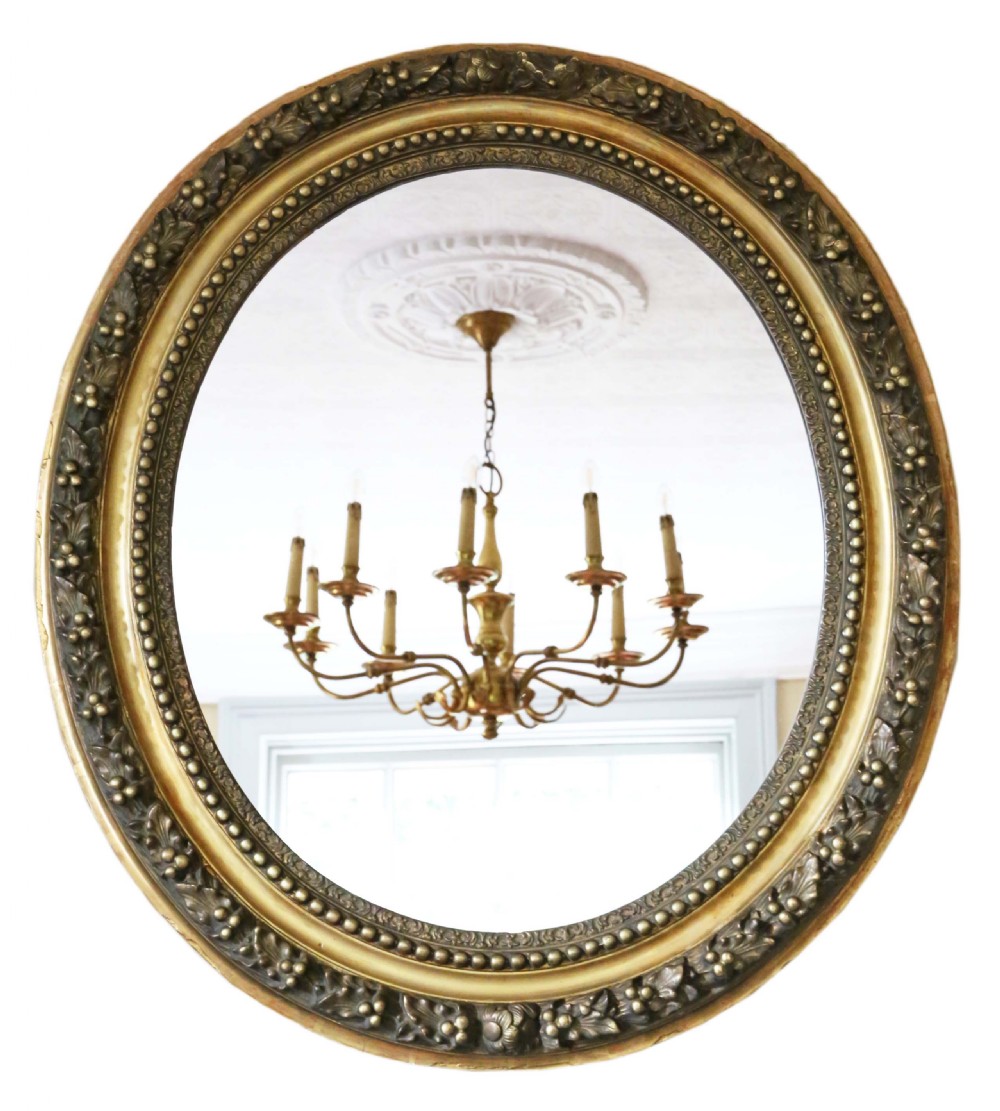 Oval gilt overmantle wall mirror 19th Century