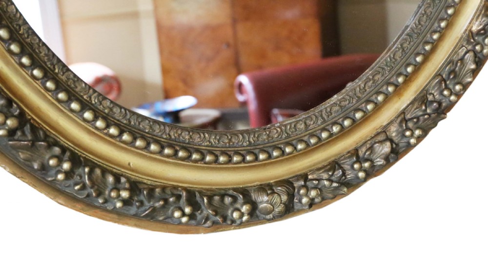 Oval gilt overmantle wall mirror 19th Century View V