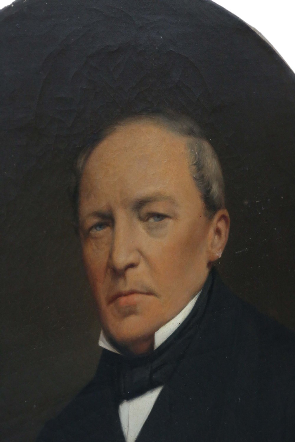 Antique oval oil on canvas portrait painting of a gentleman View II