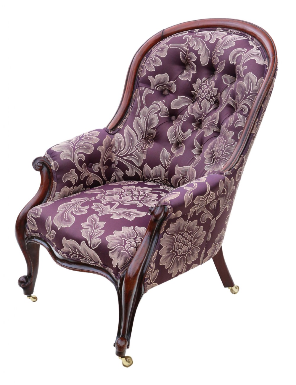 A Victorian mahogany spoon back armchair upholstered in deep purple damask fabric with deep buttoning and cabriole legs. View II