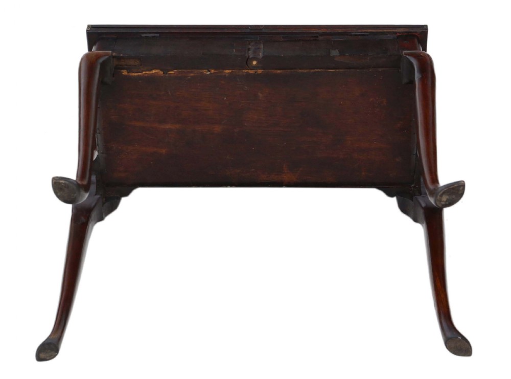 A Georgian mahogany folding card table featuring a shaped serpentine top, a single brass keyhole escutcheon, and four slender cabriole legs ending in pad feet. View XI