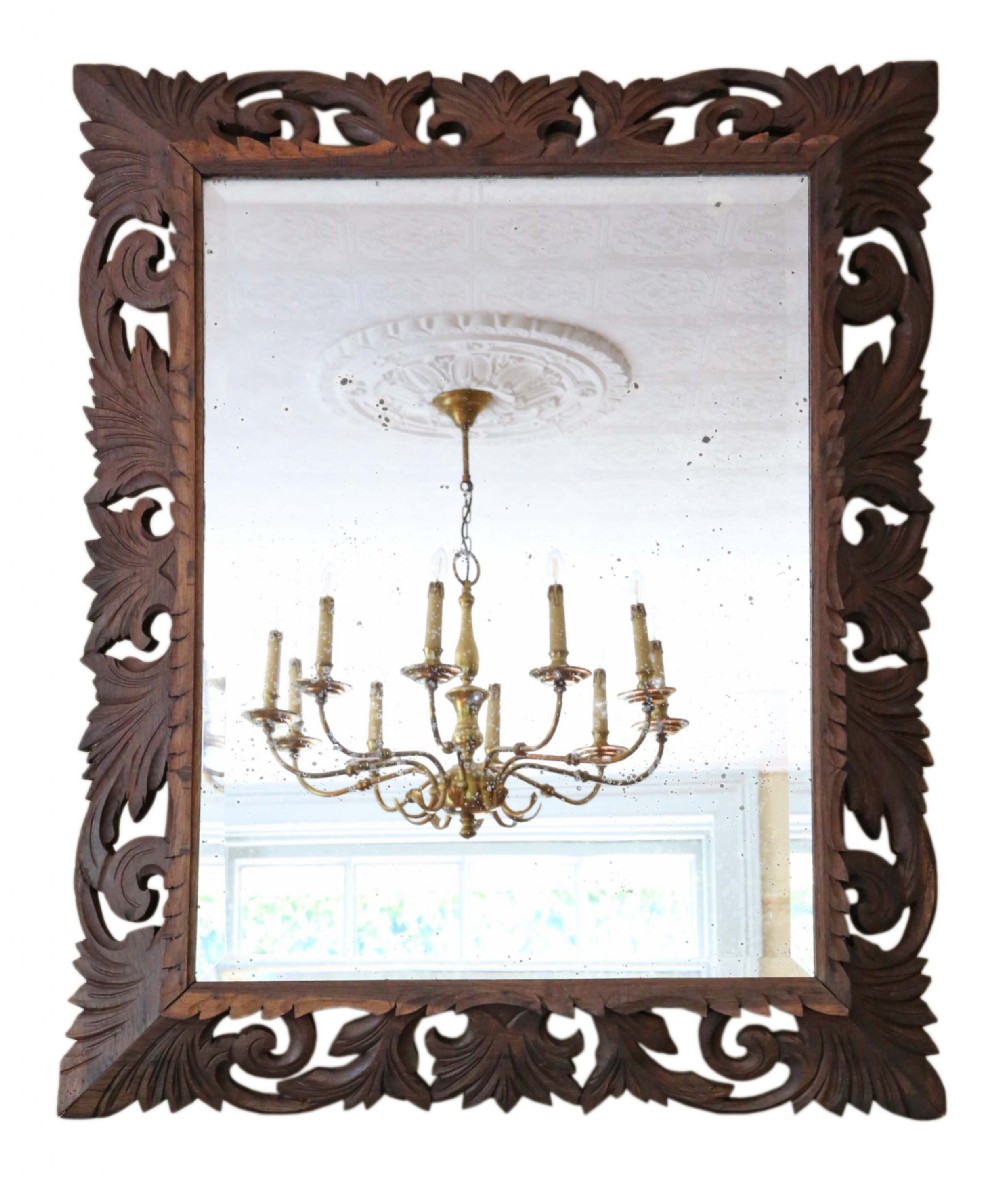 Florentine carved Padauk wall mirror