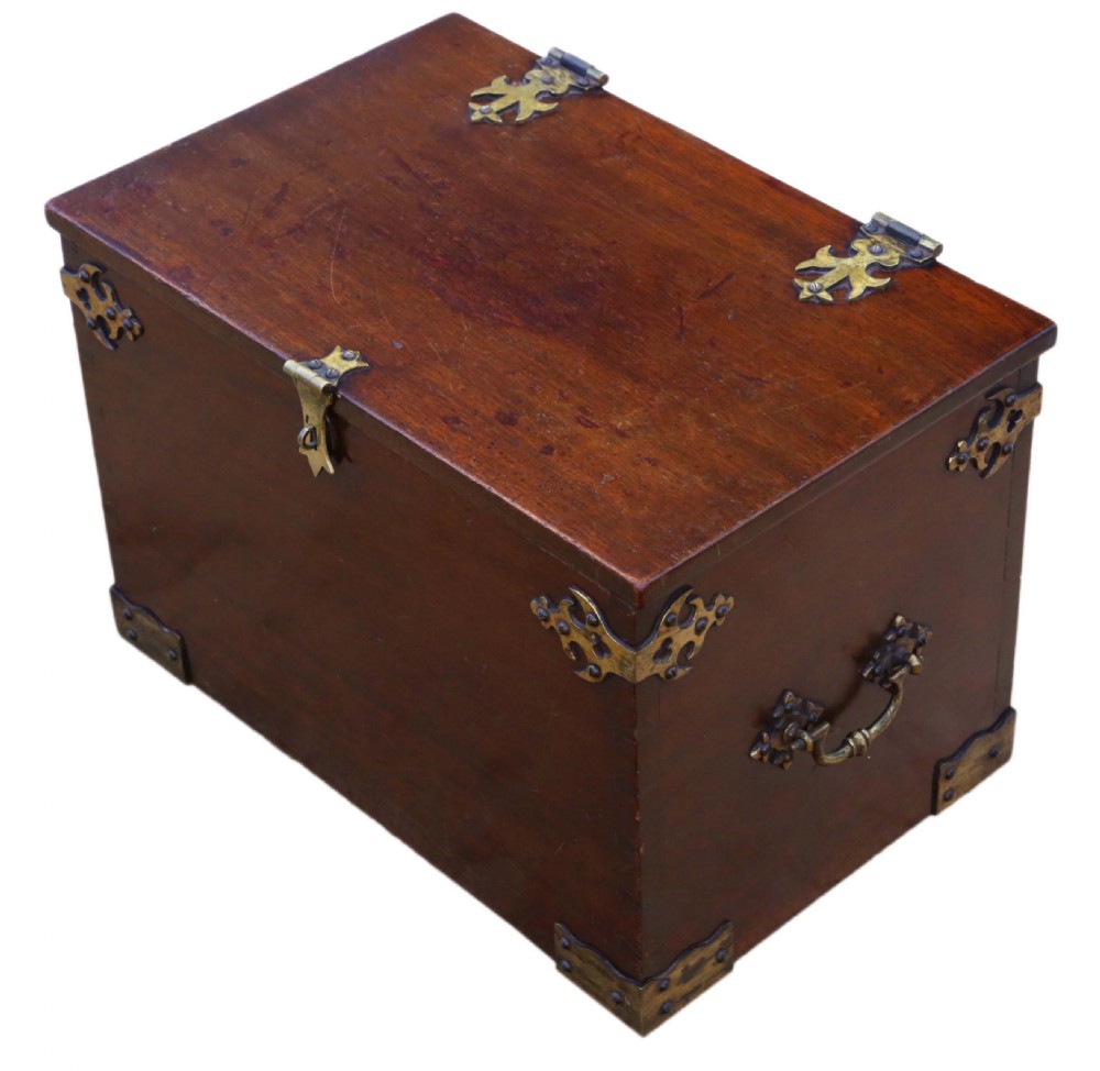 A rectangular mahogany wooden box featuring decorative brass corner mounts, top strap hinges, and a central brass clasp mechanism. View III