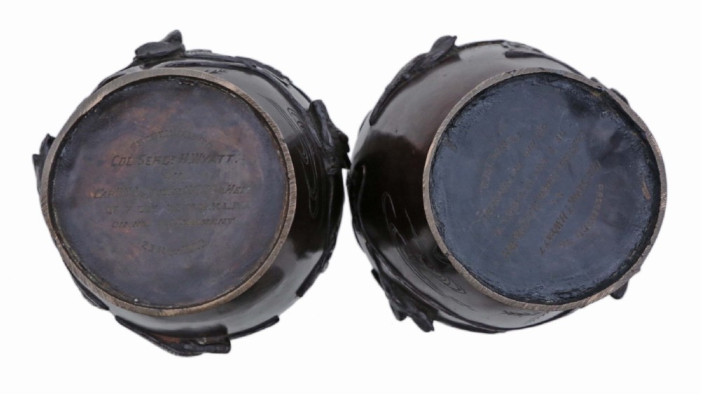 A pair of large Japanese dark bronze presentation vases featuring high-relief bird motifs alongside stylized drop handles. View IX