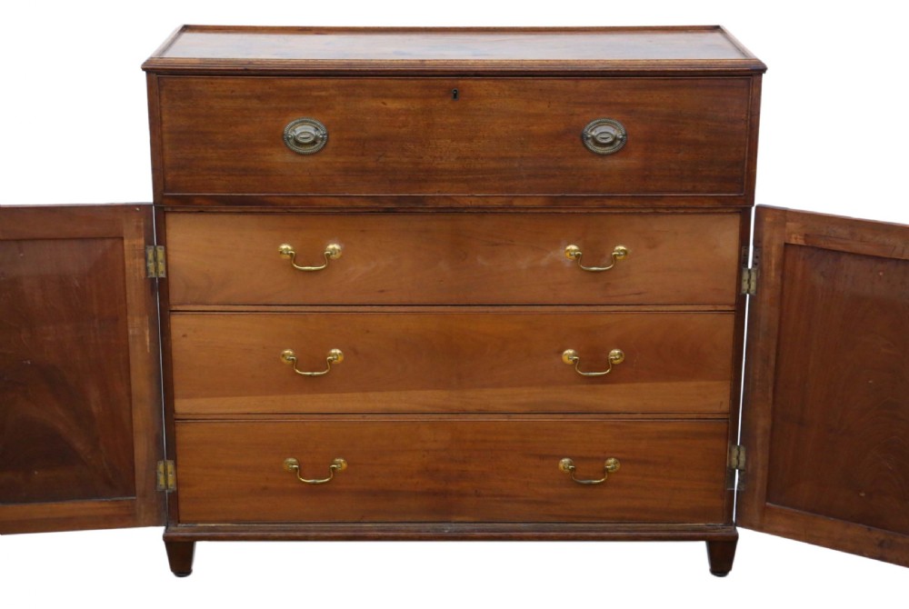 A 19th-century rich mahogany cabinet featuring a single top drawer with oval brass handles above two panelled cupboard doors. View III