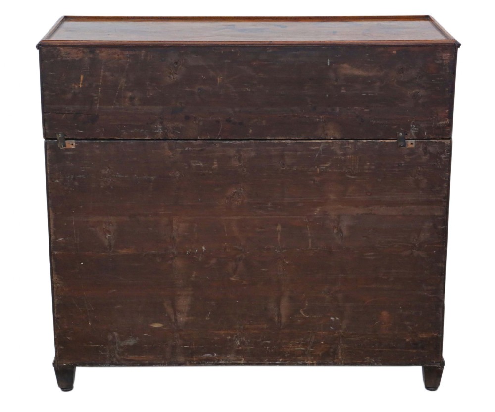 A 19th-century rich mahogany cabinet featuring a single top drawer with oval brass handles above two panelled cupboard doors. View XI