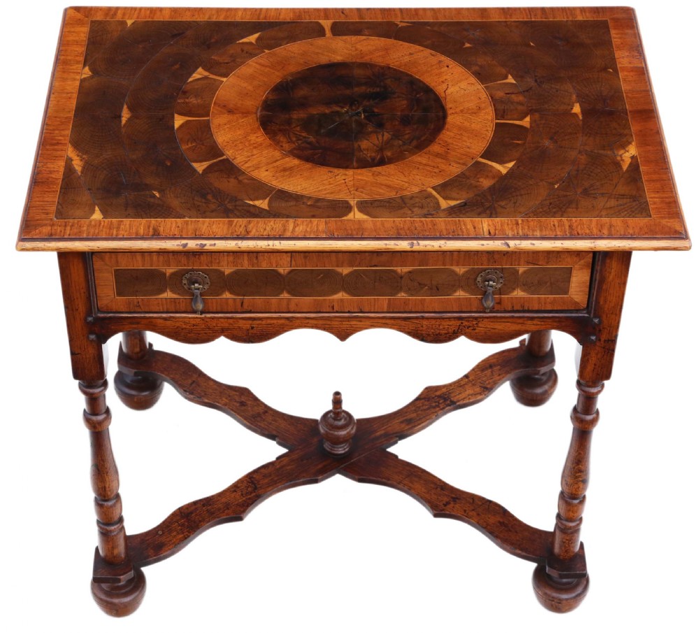 A Queen Anne revival walnut side table featuring a circular oyster veneer top pattern, a single drawer with brass handles, turned legs, and an X-stretcher. View II