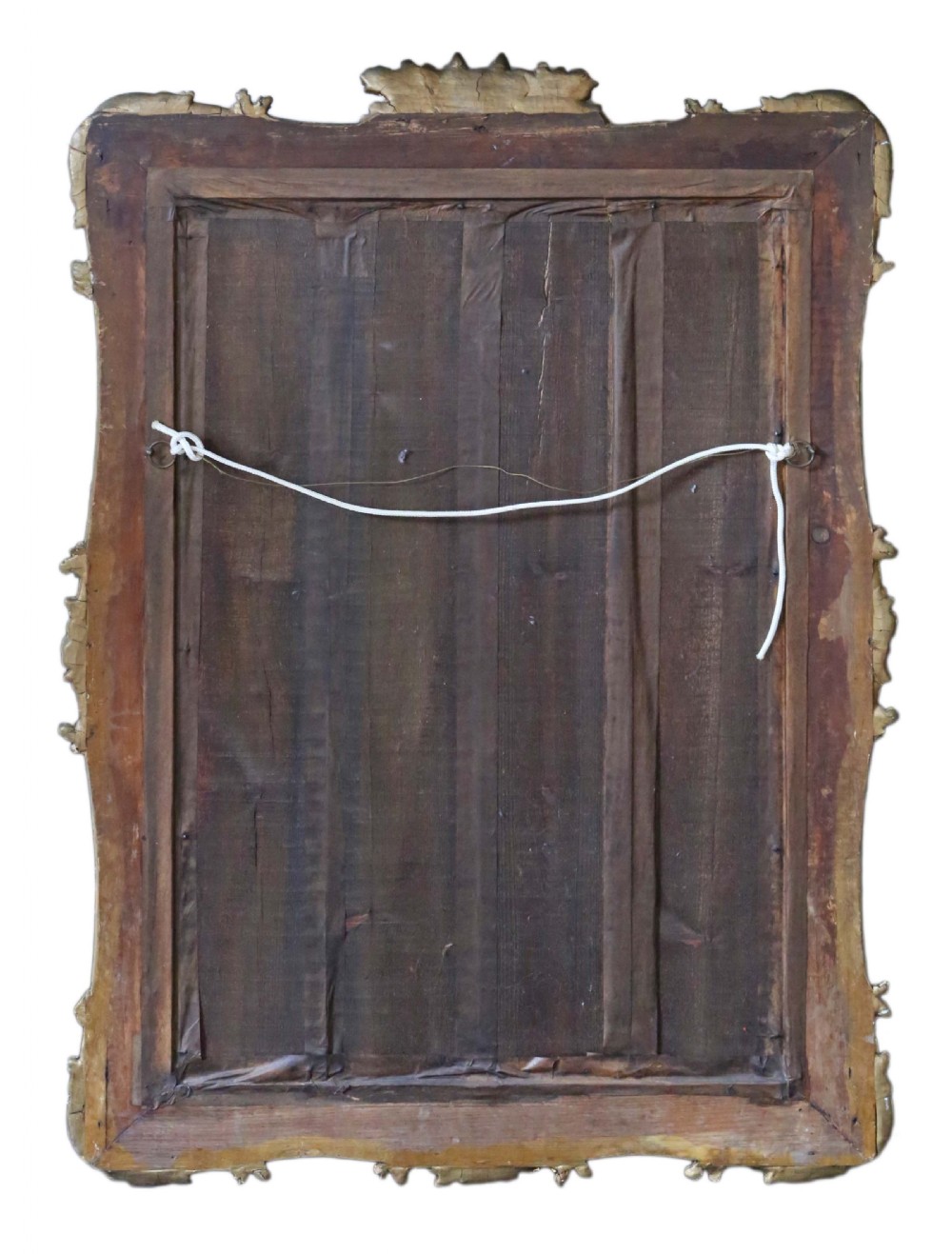 A 19th-century rectangular giltwood overmantle mirror featuring rococo scrollwork ornamentation and a central carved fox head crest at the top. View V