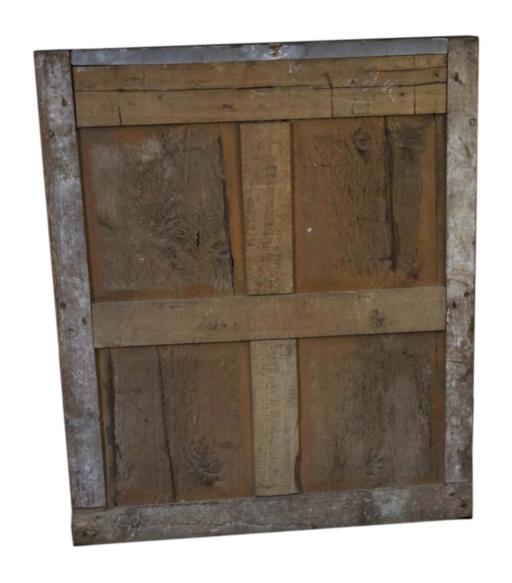 A large nineteenth-century rectangular French overmantle mirror with a cream-painted frame featuring moulded floral scrollwork details and a distressed finish. View IX