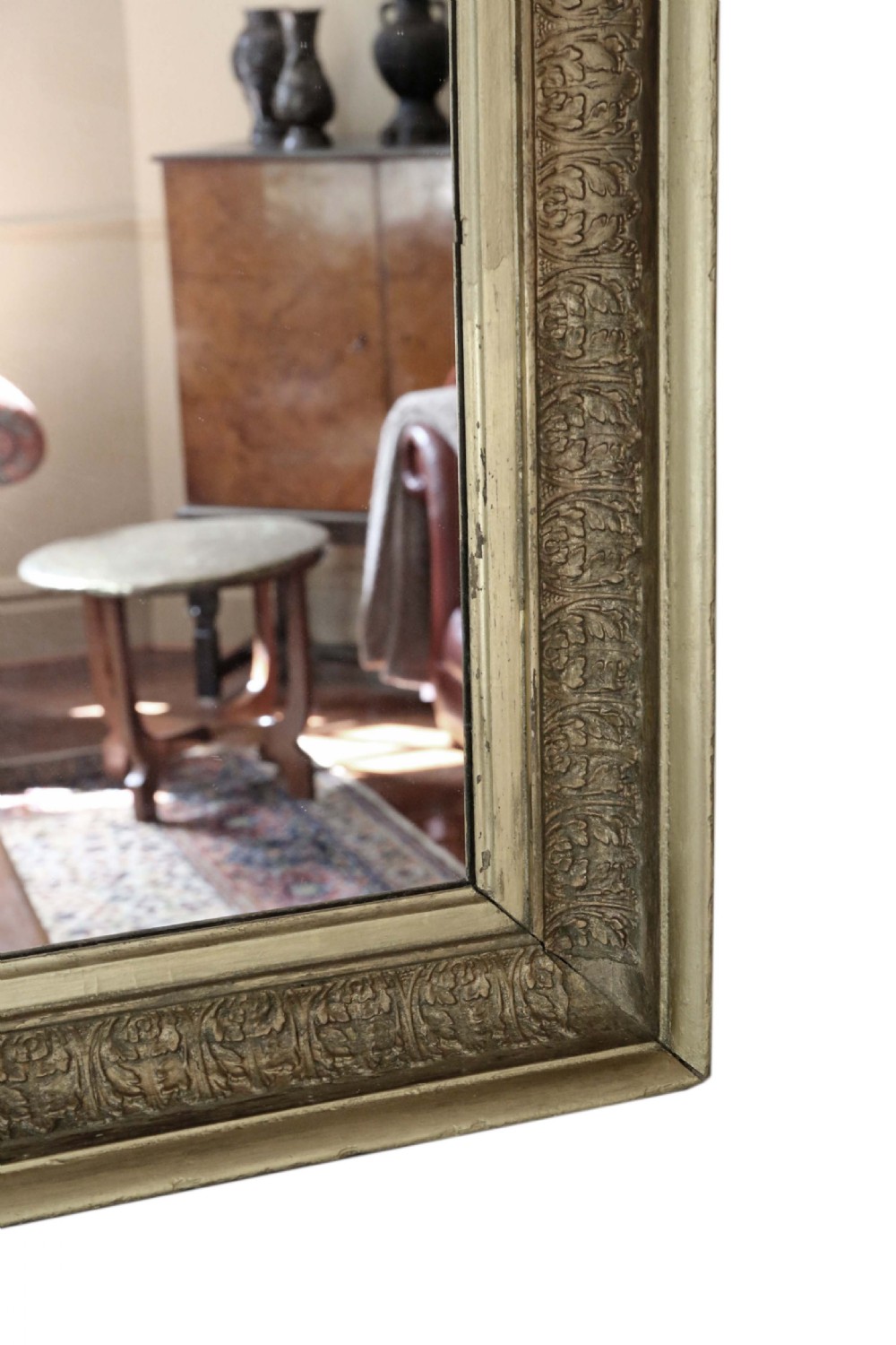 A large mid-19th-century rectangular mirror featuring a heavy gold gilt frame with carved foliage moulding. View IV